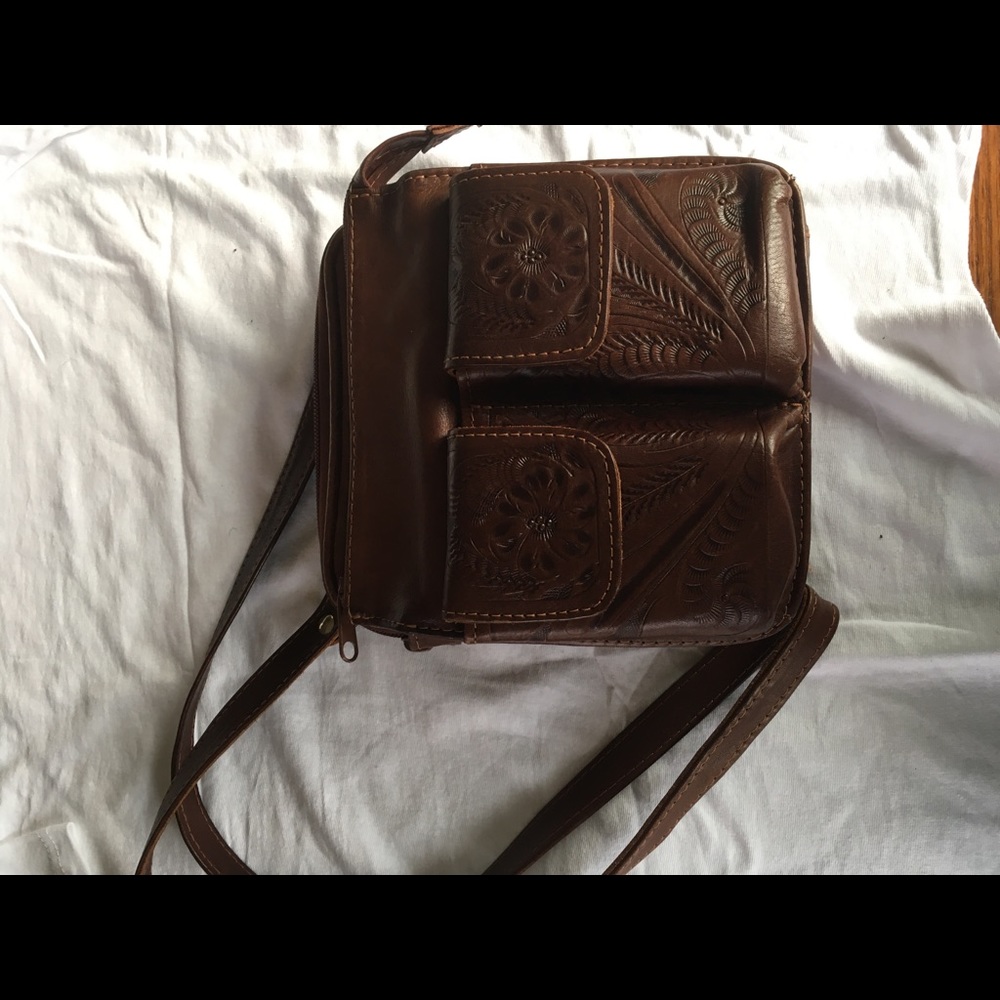 Hand tooled all leather adjustable strap handbag